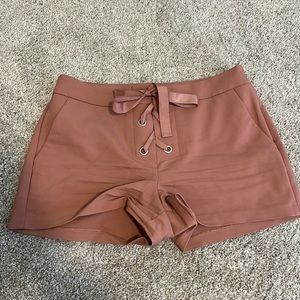 Express blush pink mid rise shorts
